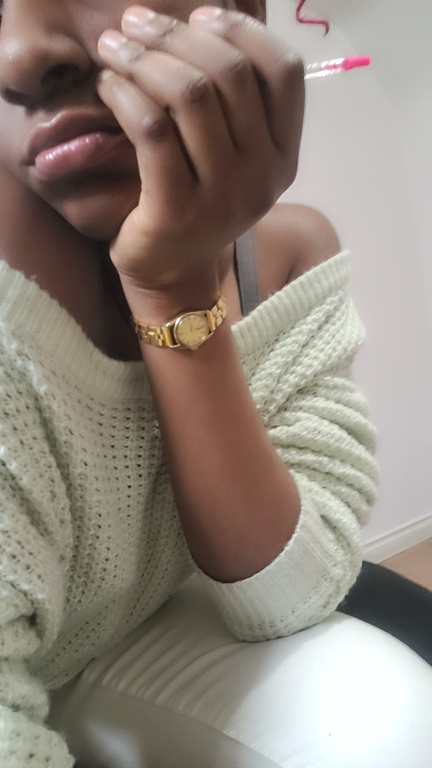 a ugc creator with a watch on their wrist